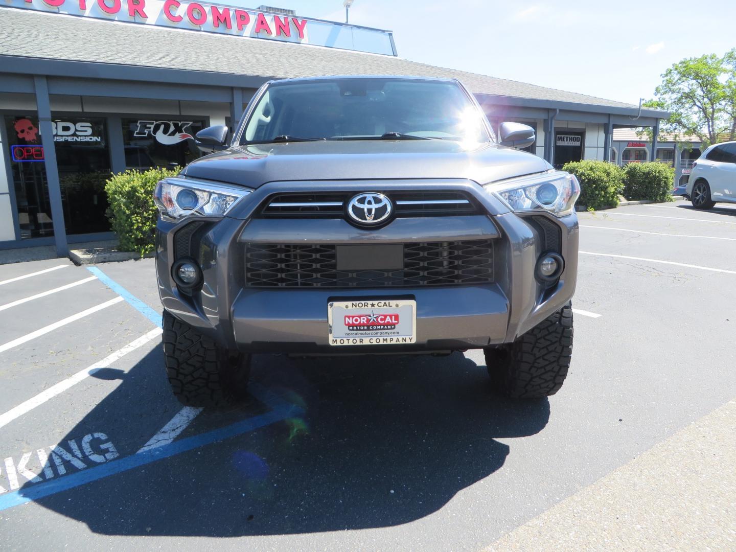 2021 CHARCOAL /BLACK Toyota 4Runner SR5 Premium 4WD (JTENU5JR0M5) with an 4.0L V6 DOHC 24V engine, 5A transmission, located at 2630 Grass Valley Highway, Auburn, CA, 95603, (530) 508-5100, 38.937893, -121.095482 - Clean SR5 Premium 7 passenger with a set of Bilstein 5100 series front struts and rear shocks, Bilstein 1" rear springs, 17" KMC 544 wheels, and Toyo RT Trail tires. - Photo#1